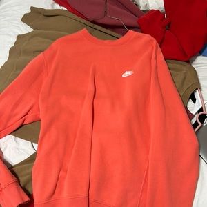 coral pink women’s crewneck nike